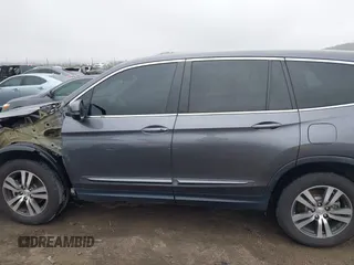 2017 Honda Pilot EX-L with VIN 5FNYF6H55HB063063, listed as a IAAI auction lot 41491193 with 75,444 mi miles and . Bid and sale history available at DreamBid. Image 15.