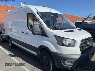 2021 Ford Transit Cargo with VIN 1FTBR1C87MKA05695, listed as a IAAI auction lot 42787001 with 49,167 mi miles and . Bid and sale history available at DreamBid. Image 2.