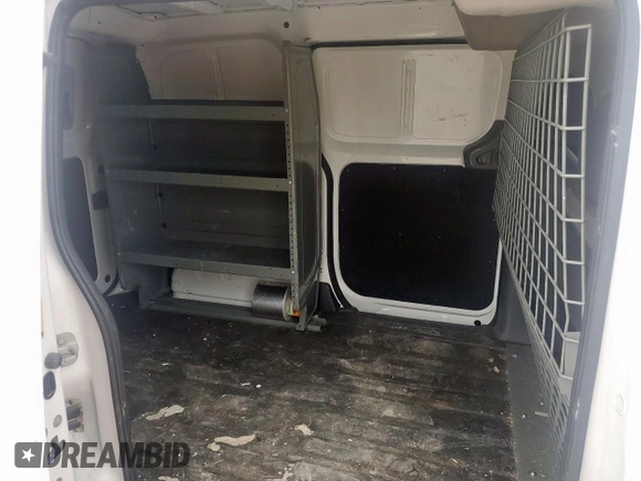 2015 Nissan NV200 S with VIN 3N6CM0KN9FK721104, listed as a Copart auction lot 57464775 with 236,441 mi miles and Salvage title. Bid and sale history available at DreamBid. Image 11.
