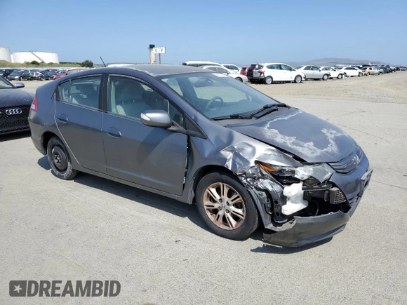 2010 Honda Insight EX with VIN JHMZE2H7XAS021268, listed as a Copart auction lot 54179245 with 211,561 mi miles and Salvage Title. Bid and sale history available at DreamBid. Image 4.