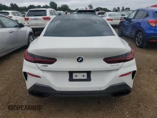 2021 BMW 8 Series 840i with VIN WBAGV4C08MCF11592, listed as a Copart auction lot 65170264 with 63,929 mi miles and Salvage Title. Bid and sale history available at carsss.com. Image 6.