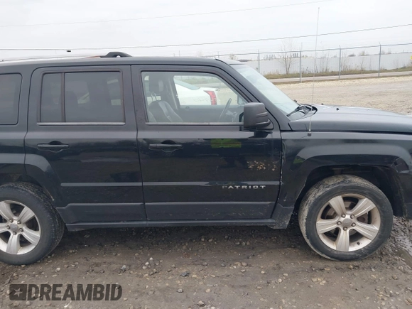 2014 Jeep Patriot Limited with VIN 1C4NJRCB7ED569805, listed as a IAAI auction lot 40854840 with 189,858 mi miles. Bid and sale history available at carsss.com. Image 13.