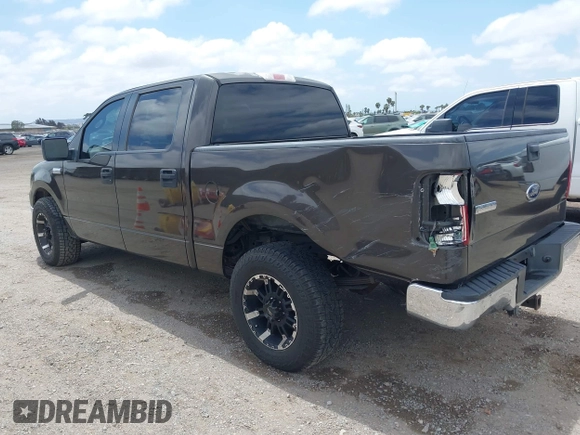 2005 Ford F-150 XLT with VIN 1FTPW12535KF05473, listed as a IAAI auction lot 42140281 with 163,023 mi miles. Bid and sale history available at carsss.com. Image 3.