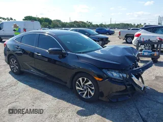 2018 Honda Civic Sedan EX with VIN 19XFC2F76JE022336, listed as a IAAI auction lot 41977879 with 75,134 mi miles. Bid and sale history available at carsss.com. Image 1.