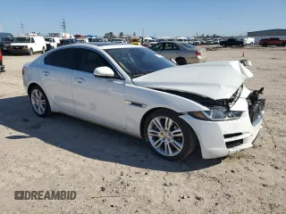 2019 Jaguar XE 25t Premium with VIN SAJAD4FX9KCP49404, listed as a Copart auction lot 48826365 with 141,322 mi miles and Salvage Title. Bid and sale history available at DreamBid. Image 4.