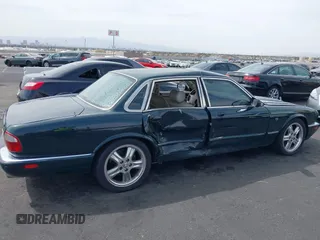 2003 Jaguar XJ with VIN SAJDA15B73MF53499, listed as a IAAI auction lot 41896445 with 95,055 mi miles and . Bid and sale history available at DreamBid. Image 6.