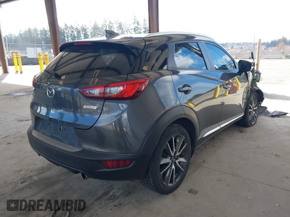 2017 Mazda CX-3 Grand Touring z VIN JM1DKFD70H0150496, wystawiony jako IAAI lot #41746038 z przebiegiem 108 091 mil mil oraz . Historia ofert i sprzedaży dostępna na DreamBid. Obrazek 4.