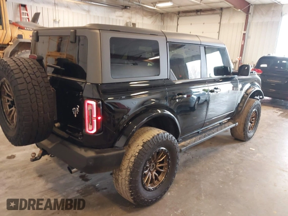2022 Ford Bronco with VIN 1FMDE5DH0NLB06451, listed as a IAAI auction lot 42060509 with 55,624 mi miles and . Bid and sale history available at DreamBid. Image 4.