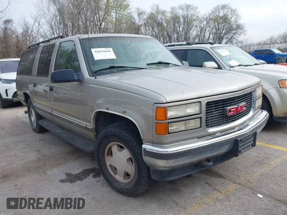 1998 GMC Suburban z VIN 3GKFK16R1WG510379, wystawiony jako IAAI lot #41859604 z przebiegiem 300 493 mil mil oraz . Historia ofert i sprzedaży dostępna na DreamBid. Obrazek 1.