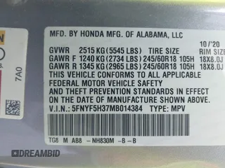 2021 Honda Pilot EX with VIN 5FNYF5H37MB014384, listed as a IAAI auction lot 42412500 with 36,934 mi miles and . Bid and sale history available at DreamBid. Image 9.