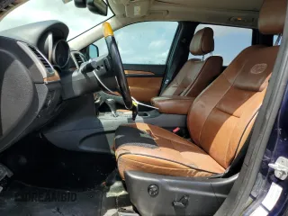 2013 Jeep Grand Cherokee Overland with VIN 1C4RJECT0DC533848, listed as a Copart auction lot 51319385 with 181,436 mi miles and Salvage Title. Bid and sale history available at carsss.com. Image 7.