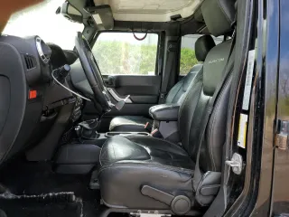 2015 Jeep Wrangler Unlimited Rubicon Hard Rock z VIN 1C4HJWFG5FL706170, wystawiony jako Copart lot #55442965 z przebiegiem Nie podano mil oraz Czysty tytuł • Clean title. Historia ofert i sprzedaży dostępna na DreamBid. Obrazek 7.