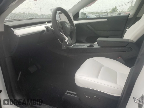 2024 Tesla Model Y Long Range с VIN 7SAYGDEE3RA283311, выставлен на аукционе Copart как лот 56925505 с пробегом Не указан миль и Списание • Salvage title. История ставок и продаж доступна на DreamBid. Изображение 7.