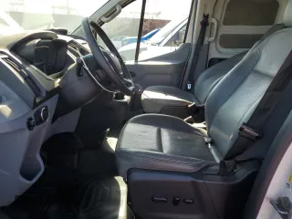 2015 Ford Transit with VIN 1FTYE9ZG5FKA23246, listed as a Copart auction lot 56057155 with 157,829 mi miles and Clean Title. Bid and sale history available at DreamBid. Image 7.