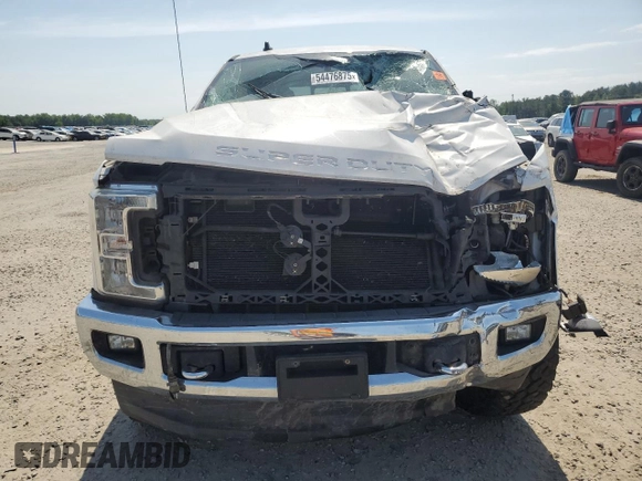 2019 Ford F-250 XL with VIN 1FT7W2BT4KED34411, listed as a Copart auction lot 54476875 with 185,274 mi miles and Salvage title. Bid and sale history available at DreamBid. Image 5.