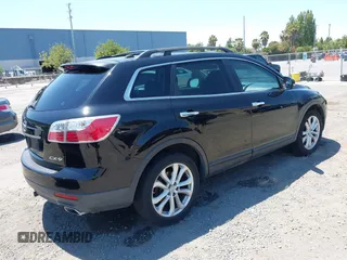 2011 Mazda CX-9 Grand Touring with VIN JM3TB2DV1B0300682, listed as a IAAI auction lot 42702969 with 195,068 mi miles and . Bid and sale history available at DreamBid. Image 4.