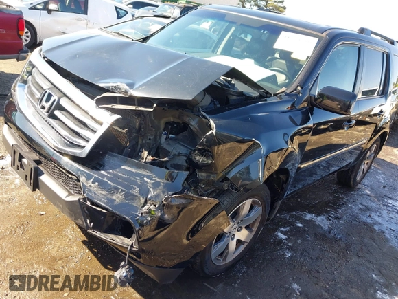 2015 Honda Pilot Touring with VIN 5FNYF3H97FB016390, listed as a IAAI auction lot 41753590 with 217,156 mi miles. Bid and sale history available at carsss.com. Image 18.