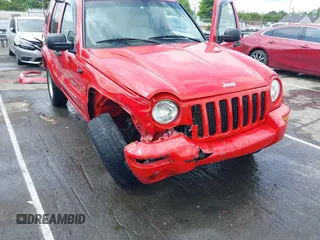 2002 Jeep Liberty Limited z VIN 1J8GL58K42W262492, wystawiony jako IAAI lot #42121270 z przebiegiem 167 662 mil mil oraz . Historia ofert i sprzedaży dostępna na DreamBid. Obrazek 6.