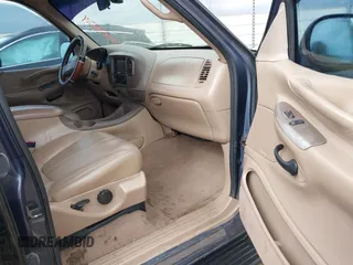 1998 Ford Expedition XLT with VIN 1FMRU17L4WLB39665, listed as a IAAI auction lot 41504254 with 328,171 mi miles. Bid and sale history available at carsss.com. Image 5.