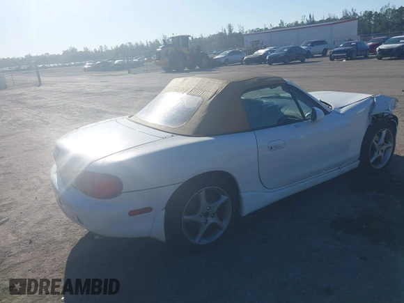 2003 Mazda MX-5 Miata Cloth z VIN JM1NB353730312566, wystawiony jako IAAI lot #41782864 z przebiegiem Nie podano mil oraz . Historia ofert i sprzedaży dostępna na DreamBid. Obrazek 4.