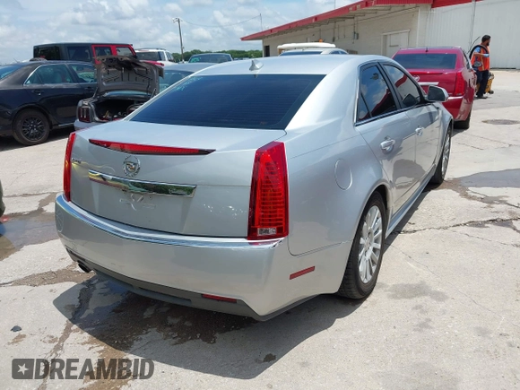 2013 Cadillac CTS Luxury with VIN 1G6DE5E56D0179190, listed as a IAAI auction lot 42726459 with 145,393 mi miles and . Bid and sale history available at DreamBid. Image 4.