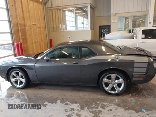 2013 Dodge Challenger SXT z VIN 2C3CDYAG9DH629189, wystawiony jako IAAI lot #41374015 z przebiegiem Nie podano mil oraz . Historia ofert i sprzedaży dostępna na DreamBid. Obrazek 14.