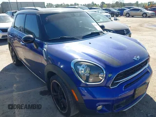 2015 MINI Cooper Countryman S with VIN WMWZC5C50FWP47426, listed as a IAAI auction lot 41725870 with 103,268 mi miles. Bid and sale history available at carsss.com. Image 1.
