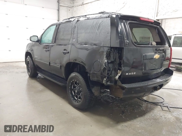 2013 Chevrolet Tahoe LT with VIN 1GNSKBE07DR305706, listed as a IAAI auction lot 42004594 with 166,020 mi miles and . Bid and sale history available at DreamBid. Image 3.
