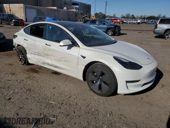 2023 Tesla Model 3 with VIN 5YJ3E1EA1PF556562, listed as a Copart auction lot 48413235 with 11,980 mi miles and Salvage Title. Bid and sale history available at DreamBid. Image 4.