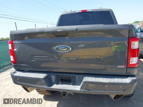 2021 Ford F-150 XL z VIN 1FTFW1E59MFA21578, wystawiony jako IAAI lot #42007968 z przebiegiem 74 025 mil mil oraz . Historia ofert i sprzedaży dostępna na DreamBid. Obrazek 16.