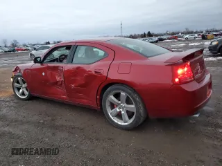 2006 Dodge Charger SRT-8 with VIN 2B3LA73W16H480803, listed as a Copart auction lot 84769274 with 110,243 mi miles and Salvage Title. Bid and sale history available at DreamBid. Image 2.