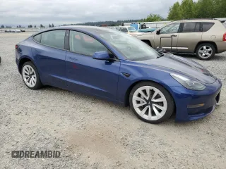 2023 Tesla Model 3 with VIN 5YJ3E1EA7PF450973, listed as a Copart auction lot 61082175 with 47,029 mi miles and Salvage title. Bid and sale history available at DreamBid. Image 4.