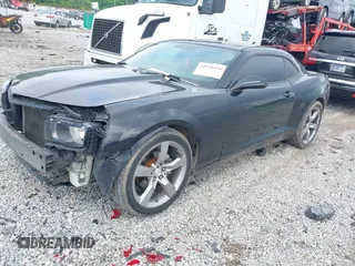 2012 Chevrolet Camaro 1LT z VIN 2G1FB1E3XC9165389, wystawiony jako IAAI lot #42126434 z przebiegiem 140 681 mil mil oraz . Historia ofert i sprzedaży dostępna na DreamBid. Obrazek 2.