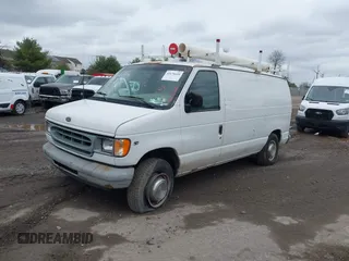 2002 Ford Econoline Cargo with VIN 1FTNE24L02HB73531, listed as a IAAI auction lot 41676620 with 125,683 mi miles and . Bid and sale history available at DreamBid. Image 2.