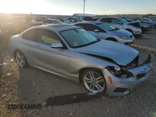 2016 BMW 2 Series 228i with VIN WBA1F5C57GV343907, listed as a Copart auction lot 70606704 with 107,211 mi miles and Salvage title. Bid and sale history available at DreamBid. Image 4.