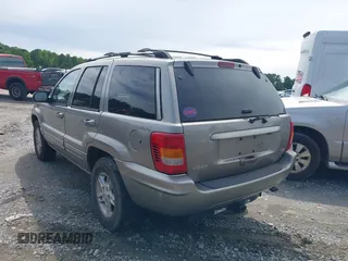 1999 Jeep Grand Cherokee Limited with VIN 1J4GW68N9XC808639, listed as a IAAI auction lot 42521785 with 156,864 mi miles and . Bid and sale history available at DreamBid. Image 3.