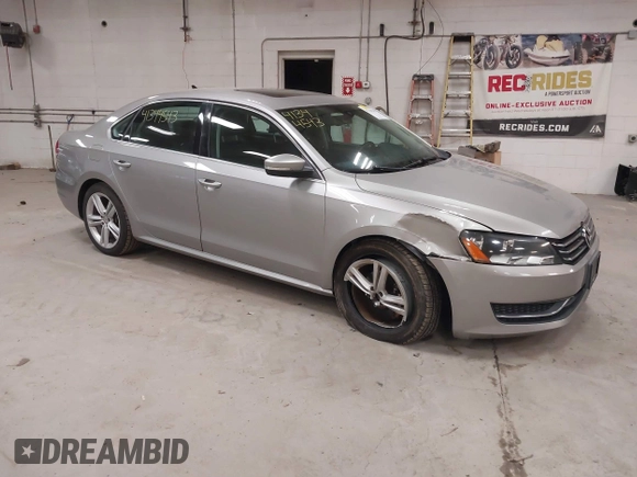 2014 Volkswagen Passat SE z VIN 1VWBT7A31EC102802, wystawiony jako IAAI lot #41344543 z przebiegiem 106 758 mil mil oraz . Historia ofert i sprzedaży dostępna na DreamBid. Obrazek 1.