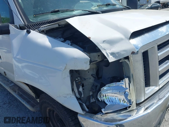 2009 Ford Econoline Cargo with VIN 1FTNE24W99DA45347, listed as a IAAI auction lot 42068121 with 301,292 mi miles. Bid and sale history available at carsss.com. Image 12.