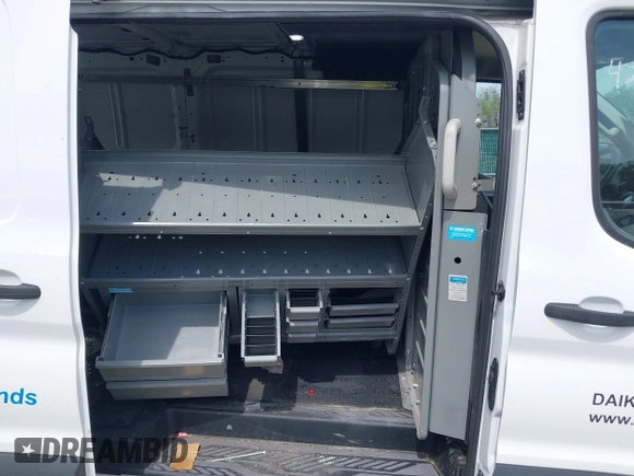 2021 Ford Transit Cargo z VIN 1FTBR1Y89MKA66720, wystawiony jako IAAI lot #42064777 z przebiegiem 112 171 mil mil oraz . Historia ofert i sprzedaży dostępna na DreamBid. Obrazek 8.