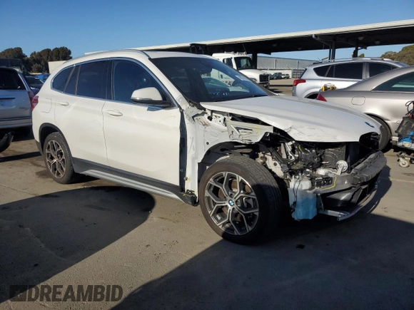 2021 BMW X1 xDrive28i with VIN WBXJG9C09M5S71263, listed as a Copart auction lot 46374565 with 61,537 mi miles and Salvage Title. Bid and sale history available at carsss.com. Image 4.