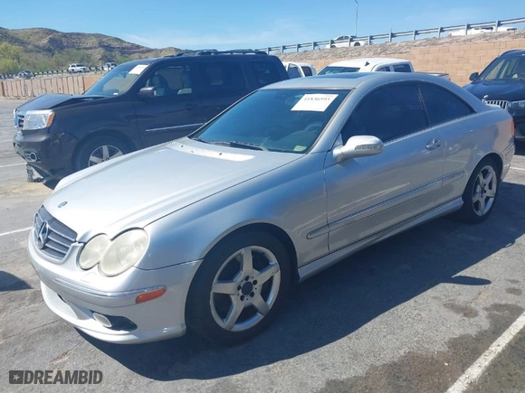2005 Mercedes-Benz CLK-Class 5.0L with VIN WDBTJ75J35F142835, listed as a IAAI auction lot 41836593 with 1 mi miles. Bid and sale history available at carsss.com. Image 2.