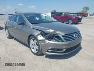 2013 Volkswagen CC Sport with VIN WVWBN7AN2DE555375, listed as a IAAI auction lot 42048643 with 125,484 mi miles and . Bid and sale history available at DreamBid. Image 1.