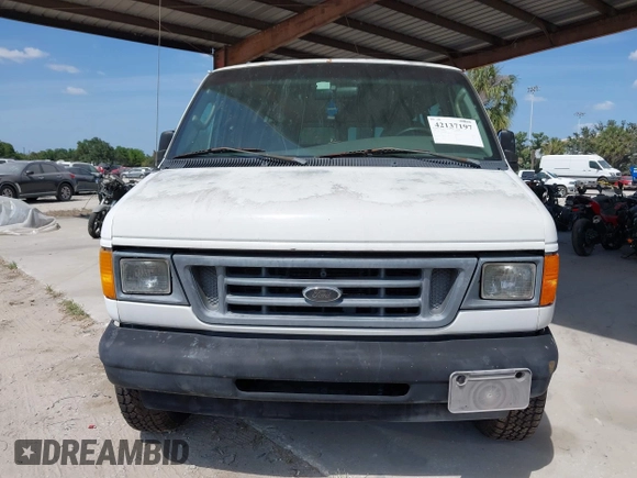 2003 Ford Econoline Passenger XL with VIN 1FBSS31L93HB99802, listed as a IAAI auction lot 42137197 with 56,656 mi miles. Bid and sale history available at carsss.com. Image 6.