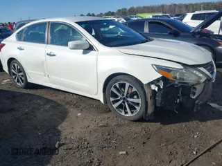 2017 Nissan Altima SV with VIN 1N4AL3AP0HC167371, listed as a IAAI auction lot 41456337 with 79,429 mi miles and . Bid and sale history available at DreamBid. Image 1.