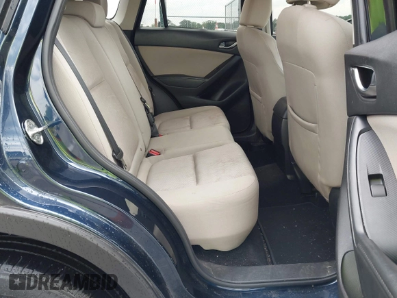 2016 Mazda CX-5 Sport with VIN JM3KE2BY0G0850298, listed as a IAAI auction lot 42107007 with 97,478 mi miles. Bid and sale history available at carsss.com. Image 8.