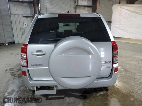 2006 Suzuki Grand Vitara Premium z VIN JS3TD943164103120, wystawiony jako Copart lot #56132585 z przebiegiem 143 313 mil mil oraz Szkoda całkowita • Salvage title. Historia ofert i sprzedaży dostępna na DreamBid. Obrazek 6.