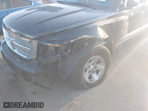 2008 Dodge Dakota Laramie with VIN 1D7HW58N18S593890, listed as a IAAI auction lot 41762135 with 109,669 mi miles. Bid and sale history available at carsss.com. Image 6.