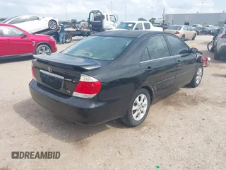 2005 Toyota Camry LE with VIN 4T1BF32K15U091945, listed as a IAAI auction lot 42124503 with 212,951 mi miles and . Bid and sale history available at DreamBid. Image 4.
