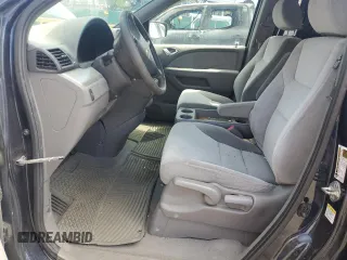 2009 Honda Odyssey LX z VIN 5FNRL38209B051664, wystawiony jako Copart lot #56710125 z przebiegiem 123 mil mil oraz Nie do naprawy • Non repairable. Historia ofert i sprzedaży dostępna na DreamBid. Obrazek 7.