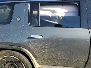 2025 Rivian R1S Adventure z VIN 7PDSGBBA5SN048839, wystawiony jako Copart lot #89199375 z przebiegiem 5177 mil mil oraz Szkody całkowita. Historia ofert i sprzedaży dostępna na DreamBid. Obrazek 12.